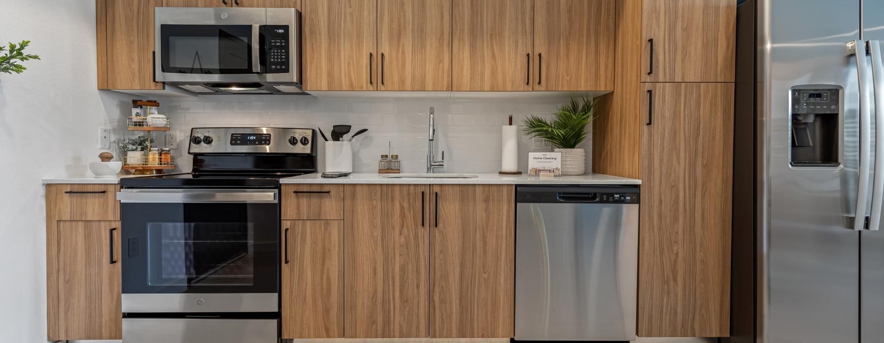 a kitchen with wooden cabinets